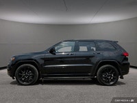 This Jeep Grand Cherokee WK delivers a Regular Unleaded V-6 3.6 L/220 engine powering this Automatic... (image 1)
