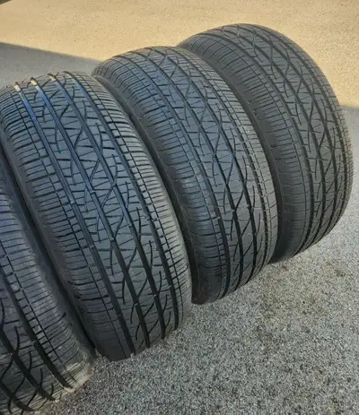Four Firestone 235/60R18 Summer Tires. Excellent Tread on the tires. Call only if interested 902-220...