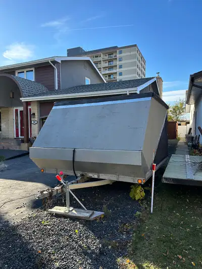 2006 triton aluminum frame trailer. Barn doors Rear view camera ,wood ramp included $3500.00 obo. 20...