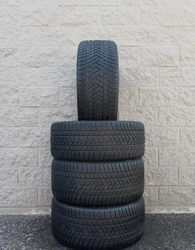 Winter / Snow Pirelli Scorpion Staggered 22 Inch Tires. 2x 285 40 22 & 2x 315 35 22 (95%). Fits: Por...