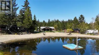 Lot includes two (2) trailers, large shed, Deck, Matching outdoor furniture, BBQ. Main trailer is a...