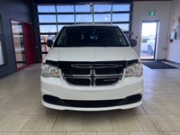 The 2019 Dodge Grand Caravan Canada Value Package in pristine white is the perfect blend of practica... (image 6)