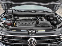 This SUV boasts a powerful turbocharged engine and all-wheel drive, providing confident performance... (image 9)