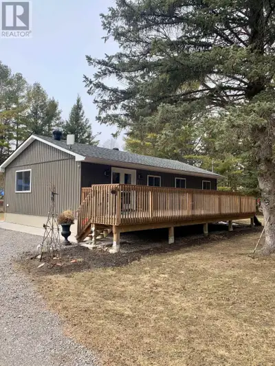 Discover this charming turn-key bungalow just a short walk from the beautiful shores of Rice Lake, p...