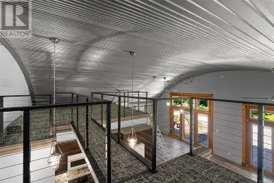 This home is a must see in person, one of a kind, pictures do not convey how awesome it is with 14 f...