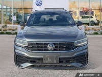 This Volkswagen Tiguan boasts a Intercooled Turbo Regular Unleaded I-4 2.0 L/121 engine powering thi... (image 7)