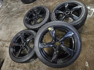 Good set of Audi replica wheels in gloss black mounted on mixed winter tires. Wheels: 18x8 Offset: 4...