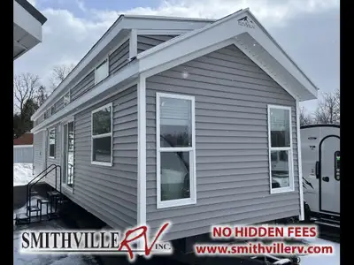 Modern park model with spacious front living area and two bedrooms! Sleeps up to 7 - rear queen bedr...