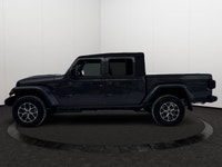This 2026 JEEP GLADIATOR SPORT 4X4 has the following options Cloth Low-Back Bucket Seats, Remote Sta... (image 1)