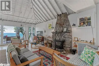 Two charming, well maintained cottages sit on one incredible waterfront lot. Tucked just a two-minut...