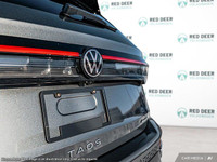The 2025 Volkswagen Taos Trendline in a sophisticated shade of gray is an all-wheel-drive SUV ready... (image 6)