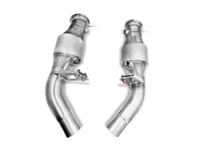 Race catalytic converters have fewer cells than standard factory systems. This reduces exhaust back...
