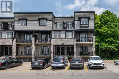Highly sought after main floor corner unit, well maintained, condo close to all amenities and expres...