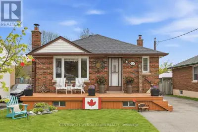 Beautifully updated 3+1 bedroom brick bungalow with detached garage on a quiet, tree-lined street in...