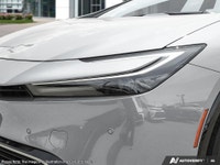 Introducing the stunning 2027 Toyota Prius Plug-In Hybrid XSE in a sleek silver finish with a smooth... (image 8)