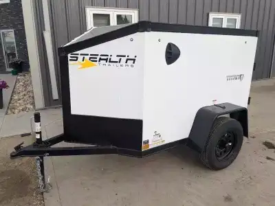 DELIVERY IN CALGARY & SURROUNDING AREAS AVAILABLE. Stealth Titan Series 2026, 4FT x 6FT Enclosed Car...