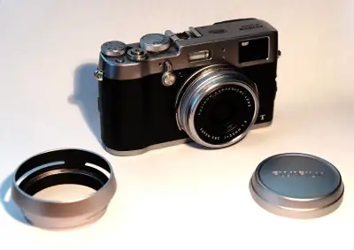 This is a lightly used X100T with only 9500 shutter actuations. It is in perfect working order. It c...