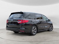 This 2020 Honda Odyssey EX-L finished in a sleek black exterior with a matching black leather interi... (image 6)