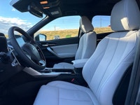 The 2025 Mitsubishi Eclipse Cross GT, bathed in a striking finish, is designed to handle diverse ter... (image 6)