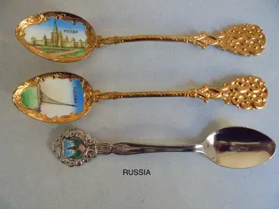Collection consists of spoons from Canada, Spain, Russia, Belgium, U.S.A., Italy, Caribbean, and an...