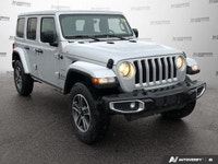 This Jeep Wrangler has a powerful Gas/Electric V-6 3.6 L/220 engine powering this Automatic transmis... (image 6)