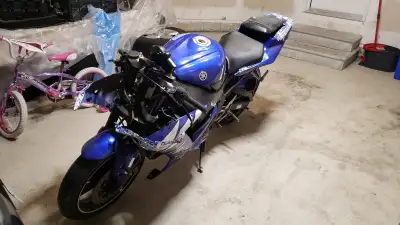 Selling 2003 Yamaha r1 has been dropped, needs work, does start and drive but need work, needs new p...
