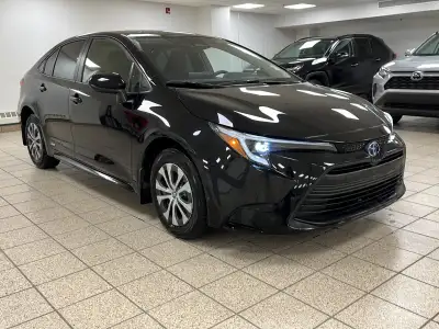 Apple CarPlay and Android Auto take center stage in this 2025 Toyota Corolla Hybrid LE, turning its...