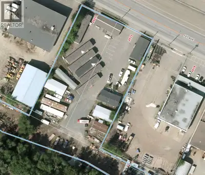 2.38 acres across three titles - a solid income-producing land play with a modular office building....