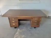 Desk.   Heavy duty wood desk $150