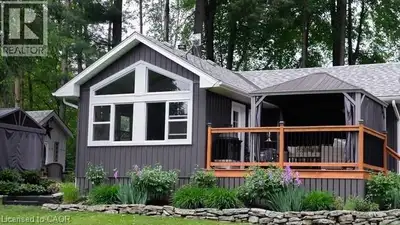 Experience the best of Lake Belwood cottage life with this stunning four-season waterfront retreat,...