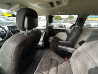 The 2015 Dodge Grand Caravan SXT is a versatile minivan designed to deliver family-friendly comfort,... (image 9)