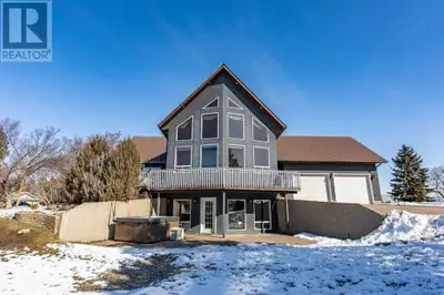 AN ACREAGE RIGHT WITHIN THE CITY OF WETASKIWIN! Lovely, well maintained, one & a half storey. 5 bedr...