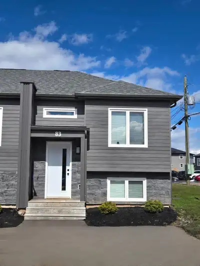 Experience contemporary living in this newly constructed townhouse, nestled in a serene neighborhood...