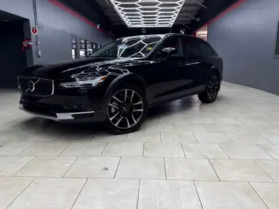 Experience the luxury and performance of the 2024 Volvo V90 Cross Country B6 AWD Plus in stunning Bl...