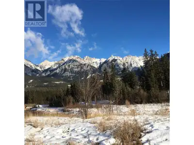 FLAT VIEW LOT, in a Gated Community, Backing onto R/S Golf, with an EXCEPTIONAL ROCKY MOUNTAIN and G...