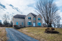KNG Presents Elegant 5-BR Home with Napanee River Views
