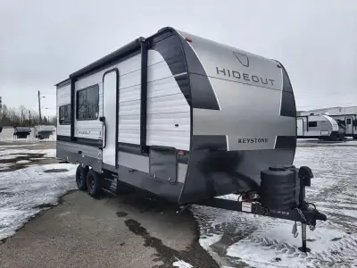 Keystone Hideout Sport travel trailer 200RL highlights: Pantry Dual Bedroom Closets Exterior Pass-Th...