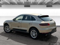 The 2015 Porsche Macan comes equipped with all-wheel drive, heated leather seats, a heated steering... (image 2)