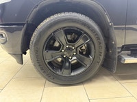 The 2019 Ram 1500 Sport 4x4 Quad Cab in a majestic black on black configuration exemplifies power, s... (image 7)