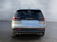 The spacious cabin offers premium refinement with perforated leather-appointed first-and second-row... (image 3)