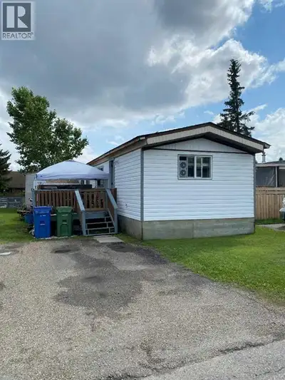 Why rent when you can own. Check out this extensively renovated mobile home located in Red Deer Vill...