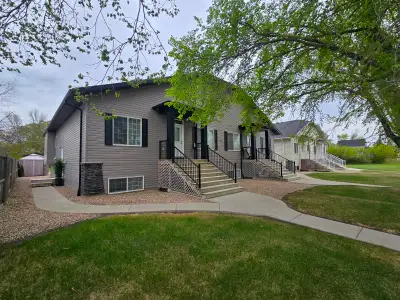 This offering presents a rare opportunity to acquire a residential four-plexe, meticulously designed...
