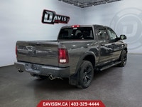 The 2022 Ram 1500 Classic Warlock 4x4 Crew Cab 5'7" Box blends rugged capability with bold style and... (image 4)