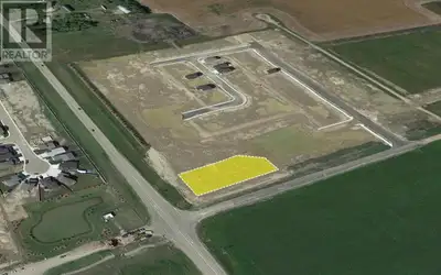 Located on the northwest corner of Highway 42 and Waskasoo Avenue in Penhold, this 0.65 acre parcel,...