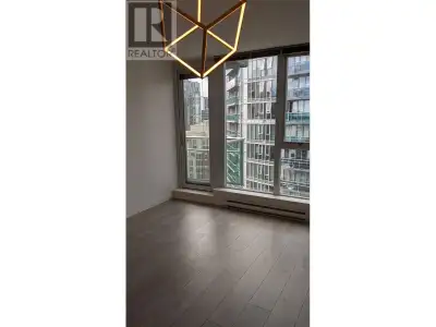 NW facing quiet one bedroom & Den suite features an open layout, 659 SF. Open kitchen, in-suite laun...