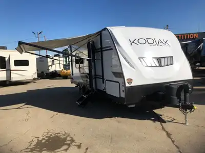 Couples Travel Trailer comes with a 200 Watt Solar Panel and an Upgraded Fantastic Fan! Call Dealers...