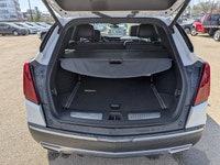 The pre-owned 2024 Cadillac XT5 Premium Luxury AWD in Mary Kay Pearl with a Jet Black interior deliv... (image 5)