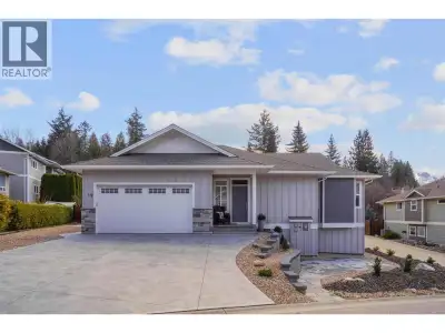 Better than new! Fully landscaped, GST paid + custom window covering & electric shade on the balcony...