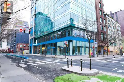 Rare opportunity to own a striking ground-floor commercial loft in the heart of Toronto, ideally pos...