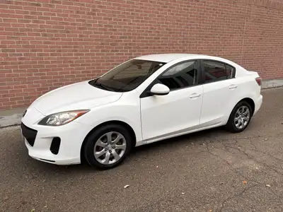 WHITE ON GREY CLOTH, DRIVES GREAT, NON SMOKER, 5 SPEED MANUAL.NEW SHOCKS, NEWER ALL SEASON TIRES. CE...